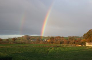 Autumn morning shower rainbow