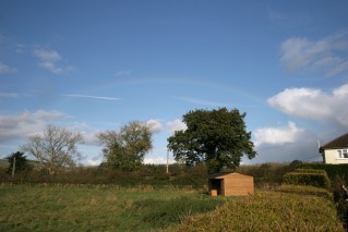 Rainbow against blue sky