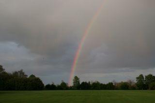 Low sun evening rainbow