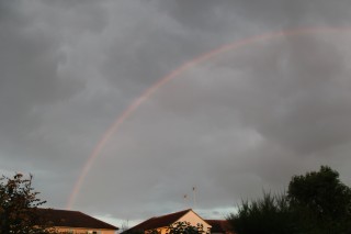 Low sun evening rainbow