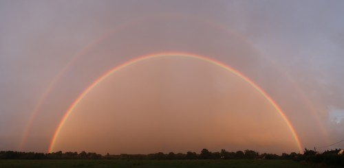 Low sun evening rainbow