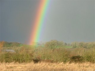 Bright rainbow approaching