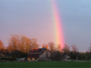 Rainbow catching golden sunset rays