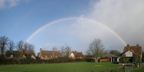 Fast moving shower rainbow