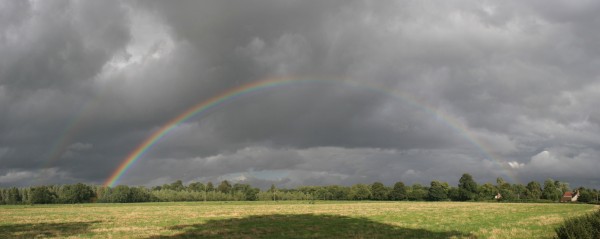 Bright afternoon rainbow