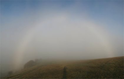 Slightly more than a half-circle fogbow
