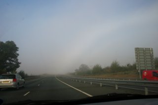 Fogbow ending on highway