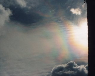 Straight iridescent bands at corona edge