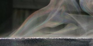 Stream of iridescent mist