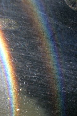 Secondary supernumerary arc in a spraybow