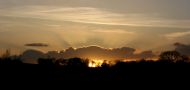 Cloud Shadows and Setting Sun